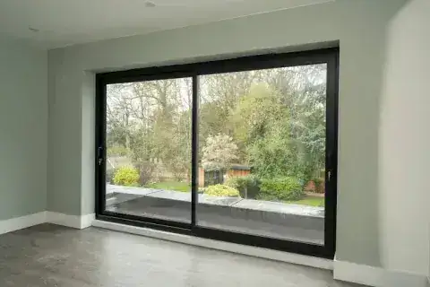 Modern home with large aluminium sliding patio doors supplied by Tradesupply Windows